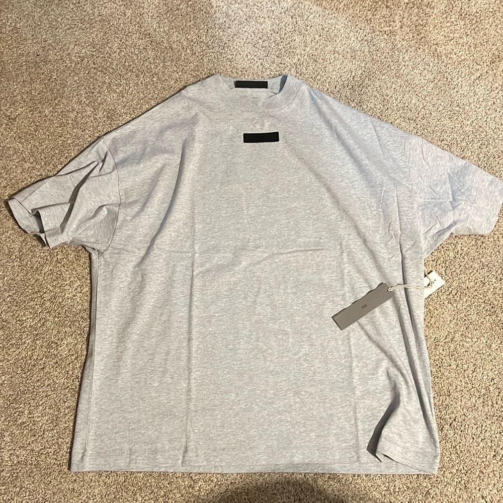 Two essentials fear of god tees. Both size medium. Dead stock. Open to trades
